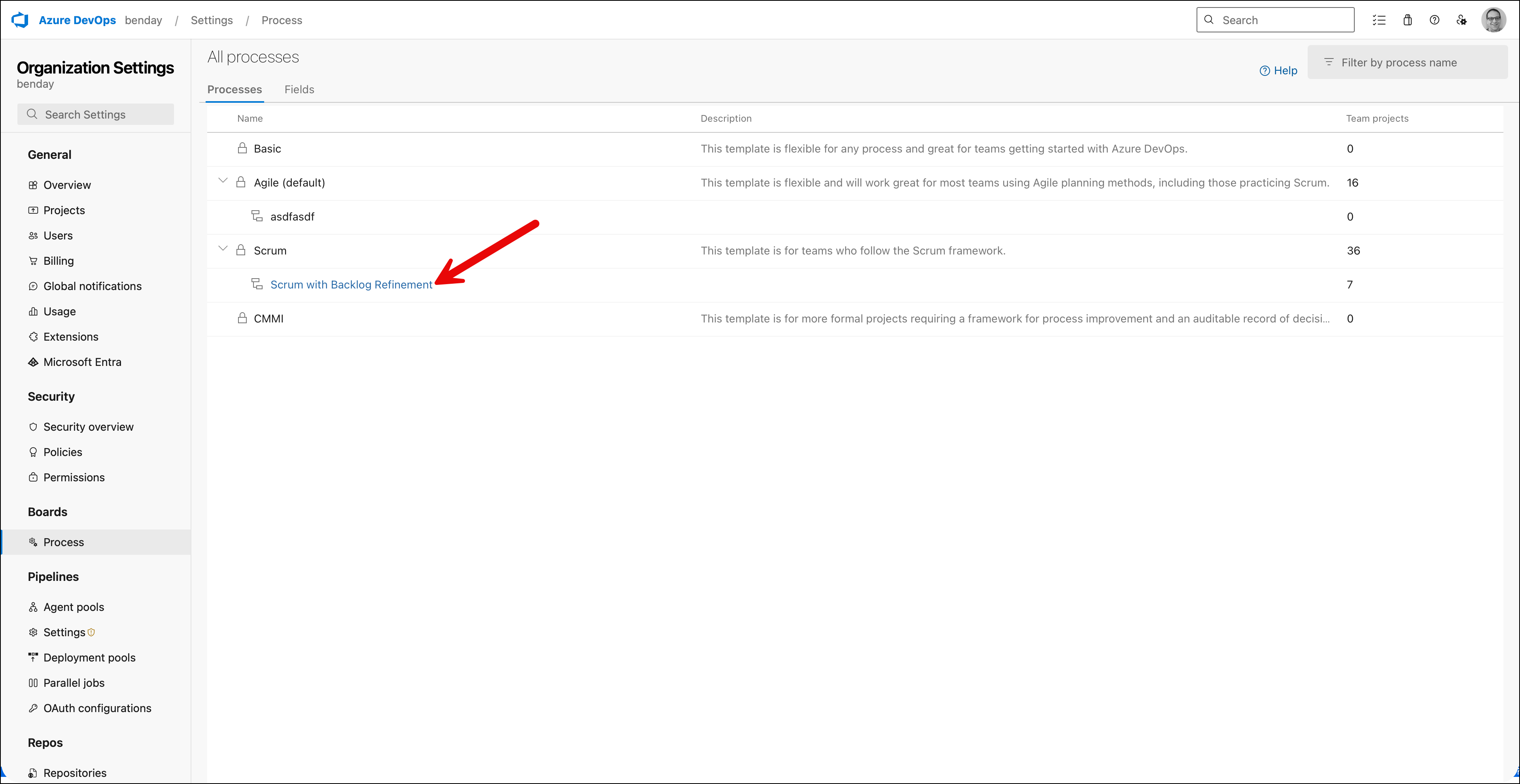 All processes page showing built-in process templates and a custom template called Scrum with Backlog Refinement with an arrow pointing to it